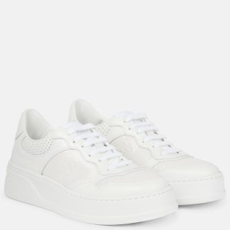 buy luxury Gucci GG embossed leather sneakers in white