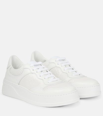 buy luxury Gucci GG embossed leather sneakers in white