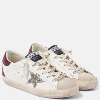 fashion designer Golden Goose Super-Star embellished leather sneakers in white