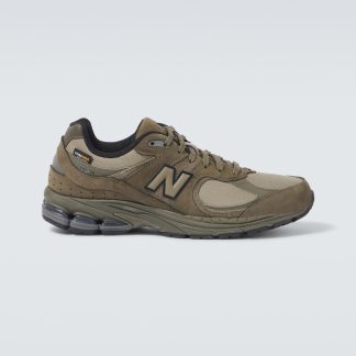 fashion designer New Balance 2002R suede-trimmed sneakers in green