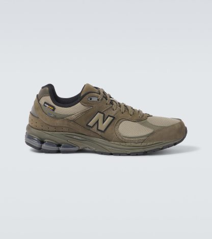 fashion designer New Balance 2002R suede-trimmed sneakers in green