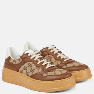 fashion luxury Gucci GG Canvas leather-trimmed sneakers in brown